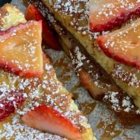 Strawberry Nutella French Toast Sando · Two slices of thick-cut Texas toast filled with Nutella and strawberries and garnished with ...