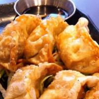 Gyoza App · Pan fried shrimp and vegetable dumplings.