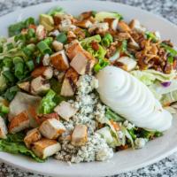 Crazy Cobb · Crisp mixed greens with bleu cheese crumbles, bacon, six oz. grilled chicken, mushrooms, tom...