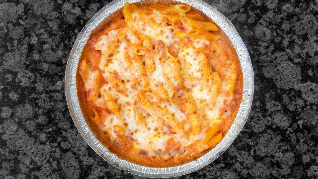 Baked Ziti · With marinara sauce, ricotta cheese, melted mozzarella cheese, and topped with shredded parmesan.  Served with garlic bread.