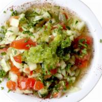 Arabic Salad · Made fresh daily, fine mix of diced tomatoes, cucumbers lemon juice, topped with olive oil.