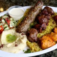 16) Pita Palace Mix Grill · 3 skewers of grilled kabob ( shish kabob , kufta kabob , chicken shish tawook ) , rice . Com...