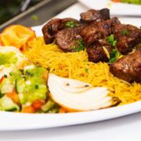 Shish Kabob Plate · 2 skewers of grilled shish kabob (beef cubes), rice. Comes with hummus, Arabic salad.