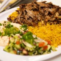 Beef Shawarma Plate · Beef shawarma (succulent layers of beef), rice. Comes with hummus, Arabic salad.
