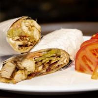 Chicken Shawarma Wrap · Chicken shawarma with pickles, garlic sauce and tomatoes. Served on Lebanon bread.