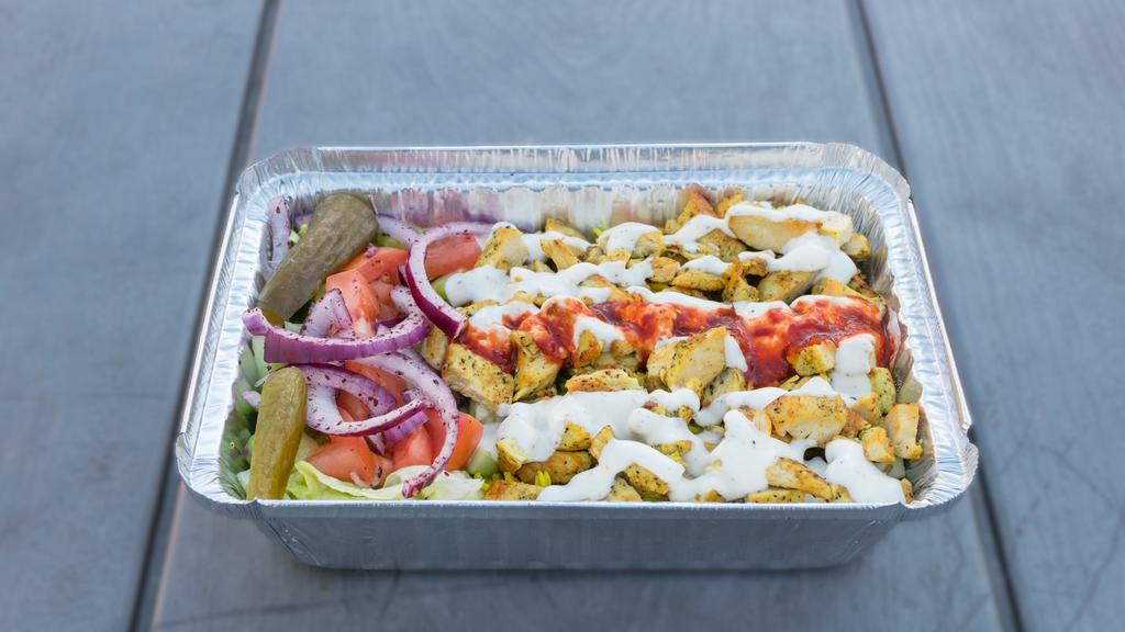6- Chicken Shawarma Plate · Chicken shawarma, rice, lettuce, cucumber, tomatoes, red onion, pickle, white sauce, and hot sauce.