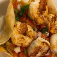 Taco Shrimp Salad · It comes with rice, beans, lettuce, pico de gallo, sour cream, corn, jalapeños, and any choi...