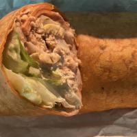 Omega Wrap · A warm tortilla wrap filled with grilled salmon, lettuce, tomato, onion, freedom and moon sa...