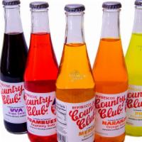 Country Club · Dominican Soda 
Choose from: Merengue, Raspberry or Grape