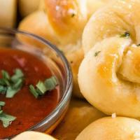 Garlic Knots · with marinara sauce