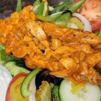 Buffalo Chicken Salad · Lettuce, tomatoes, cucumbers, banana peppers, pickles, green peppers, onions, and olives.