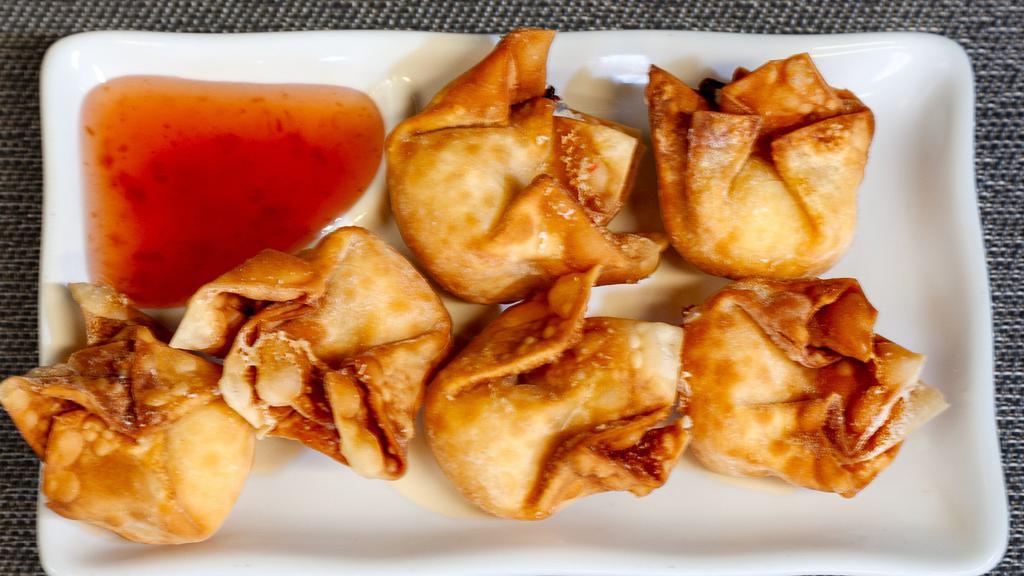 Crab Rangoon (6) · Crab and cream cheese filled wontons fried until golden brown