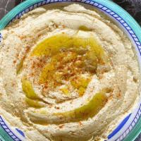 Hummus · Chickpeas, lemon juice, tahini sauce, house spices and olive oil.