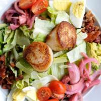 Seafood Cobb Salad · Chopped Romaine Lettuce, Diver Scallops, Egg, Pickled Onions, Smoked Bacon, Avocado, Blue Ch...