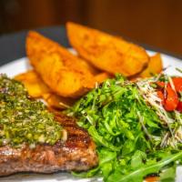 Steak Frites · Chef's Cut Grilled, Blackened Steak Potatoes, Baby Arugula, tomatoes, parmesan, Chimichurri ...