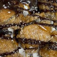 Fried Oreos · 5 Deep fried oreos with powder sugar