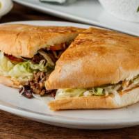Tortas · Fresh telera bread with your choice of meat, creamy cilantro lime sauce, lettuce, tomato, as...