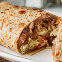 Super Texas Burrito · An extra-large flour tortilla filled with your choice of meat, beans, rice, lettuce, tomato,...