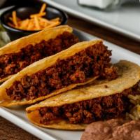 Crispy Taco Dinner (3) · Ground beef or shredded chicken with lettuce, diced tomatoes, and cheddar cheese. Served wit...