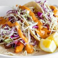 Cha Cha Tacos · Three Cha Cha Shrimp tacos with shredded cabbage, pico de gallo, jalapeno tar tar sauce, avo...