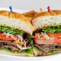 Bbq Sandwich · BBQ Soy Slices served on soft French Roll with lettuce, tomato, cucumber, picked carrots & d...