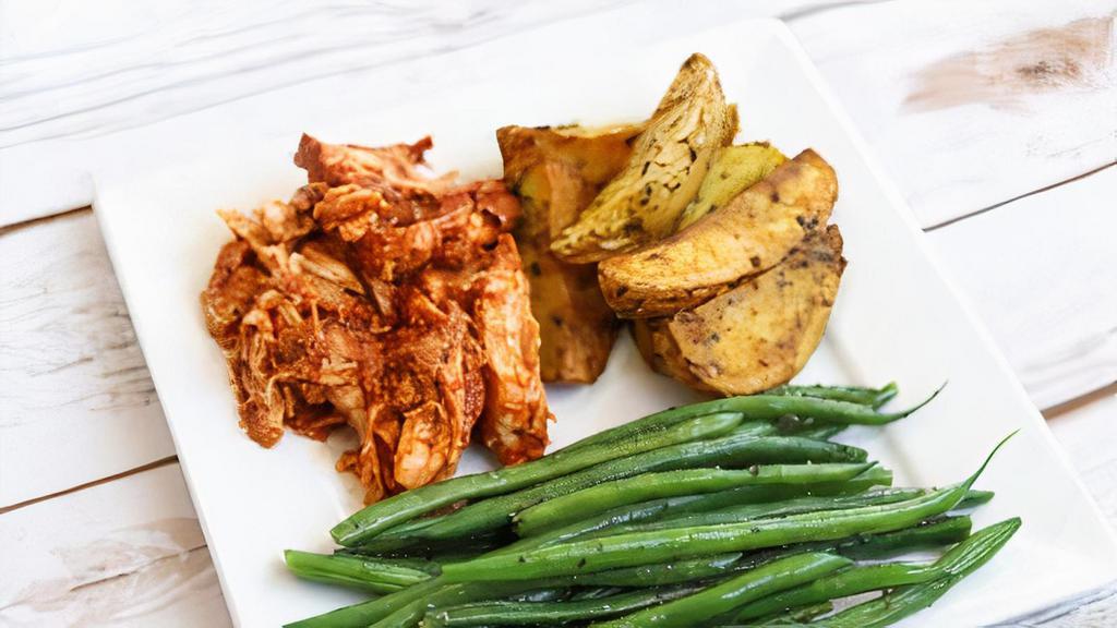 Bbq Chicken & Potatoes · Hand-shredded chicken breast with house bbq sauce paired with herb-roasted Yukon potato wedges and fresh French green beans.

*gluten & dairy free
