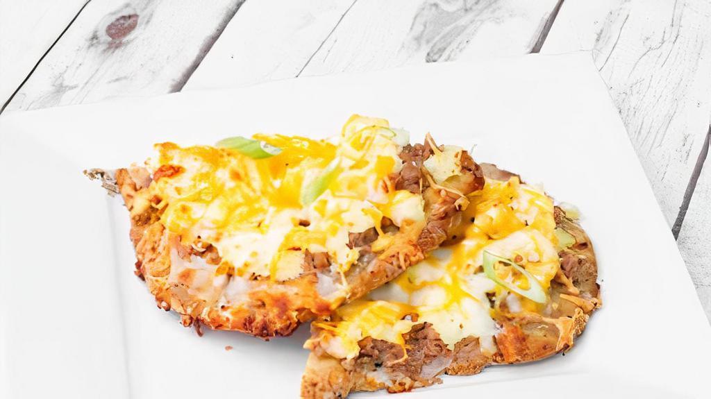 Breakfast Pizza · A gluten free flour pizza crust topped with lean ground turkey, gravy, scrambled eggs, cheddar and mozzarella cheese, then baked to perfection.

*gluten free