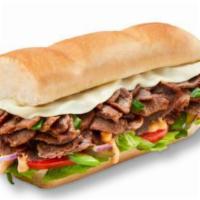 Steak & Cheese · Philly-style steak‡ mixed with onion and green peppers, topped with melted American-style ch...