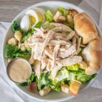 Chicken Caesar Salad · Grilled chicken, romaine lettuce, homemade croutons, eggs and Caesar dressing.