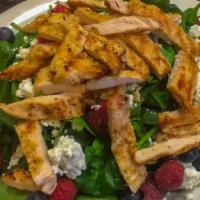 Caprina Salad With Chicken · Spring mix, green apples, pears, feta cheese, walnuts and cranberries. Served with bread and...
