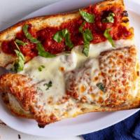 Chicken Parmigiana Sub · Served with fries.