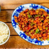 Kung Pao Chicken 宫宝鸡 · Hot and spicy. Diced chicken sautéed with vegetable and peanuts in rich sauce.