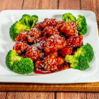 Sesame Chicken 芝麻鸡 · Chunks of chicken deep fried with sesame seeds in chefs sauce.