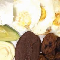 Desayuno Tipico · Eggs, beans, cheese, cream, avocado, and plantain.