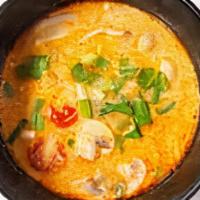 Tom Kha Soup · Gluten-free, Spicy. Chicken, galangal, coconut milk, mushroom.