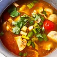 Tom Yum Soup · Gluten-free, Spicy. Chicken, lemongrass, cherry tomato, mushroom, kaffir lime, chili.