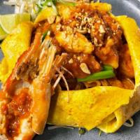 Chumphon Pad Thai · Very Spicy. Tiger prawn, jumbo lump crabmeat, shrimp, egg. chive, bean sprout, sweet radish,...