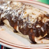 Burrito Poblano · Grilled chicken or Beef with beans rice all inside covered with our poblano sauce