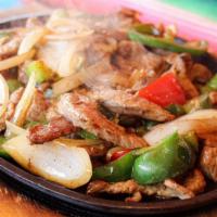 Fajitas · TENDER STEAK,GRILLED CHICKEN,ONION,PEPPERS,SERVED WITH RICE,BEANS, LETTUCE TOPPED WITH SOUR ...
