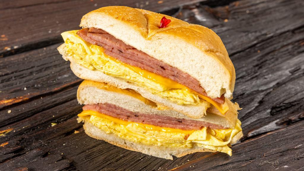 Taylor Ham, Egg, & Cheese · Taylor ham, two scrambled eggs with American cheese served on your choice of.