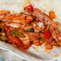Zoomys Chicken Fajita Taco · Achiote rubbed chicken fajita grilled to perfection with roasted poblano peppers, caramelize...