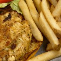 Crab Cake Sandwich · Jumbo lump crab cake served on a brioche roll with lettuce, tomato, and remoulade sauce.