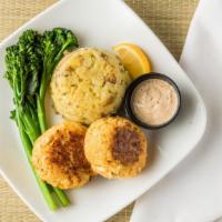 Crab Cakes · Two jumbo lump crab cakes, served with broccolini and roasted potatoes, with a side of remou...