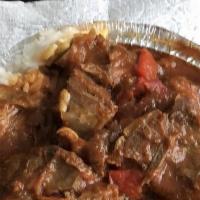 Chivo Guisado / Goat Stew · Servido con: Arroz y Habichuela o Moro o Yuca o Guineo o Tostones o Maduros / Served w/ Rice...