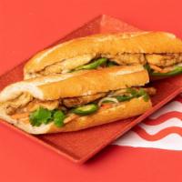 Chicken Bahn Mi · Chicken served on a french baguette with carrots, daikon, cucumber, and mint.