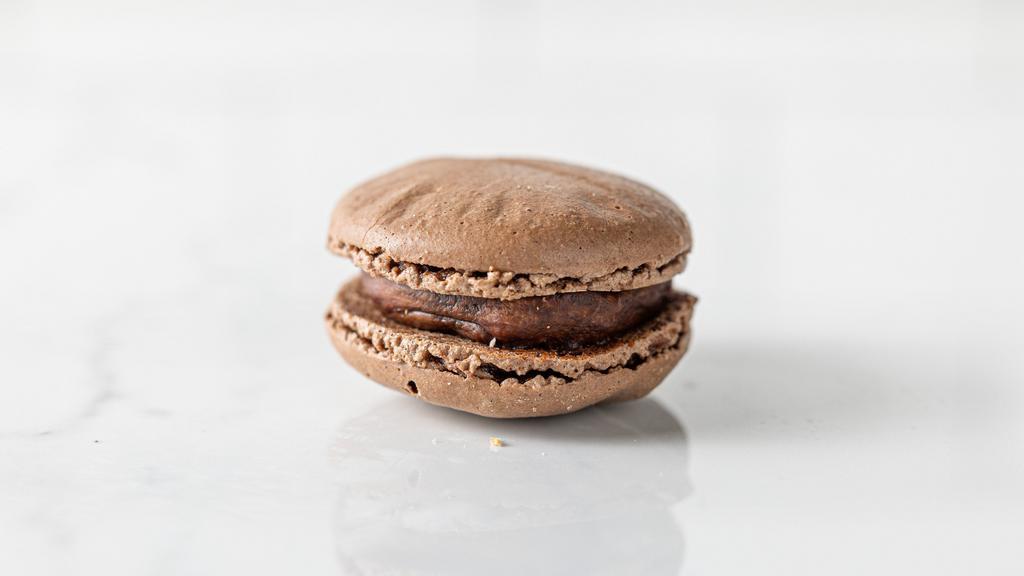 Dark Chocolate Macaron · A rich, sophisticated flavor made with 64% bittersweet dark chocolate. This macaron’s creamy fudge-like center is reminiscent of a decadent truffle. Please note that the instructions are for allergies only.