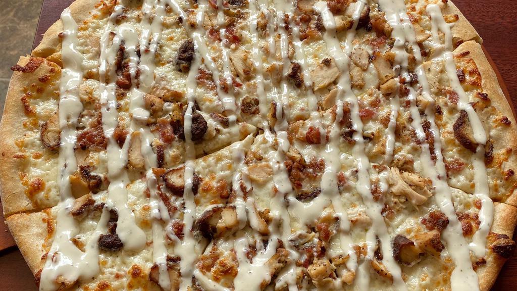 Ranchers Pizza · Grilled chicken, smoked bacon, mozzarella cheese drizzled ranch.
