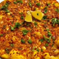 Kurdish Veggie Pie Medium · Roasted Potatoes, Minced Onions, Roasted Red Peppers, Fresh Garlic, Parsley, Urfa Chilli Ser...