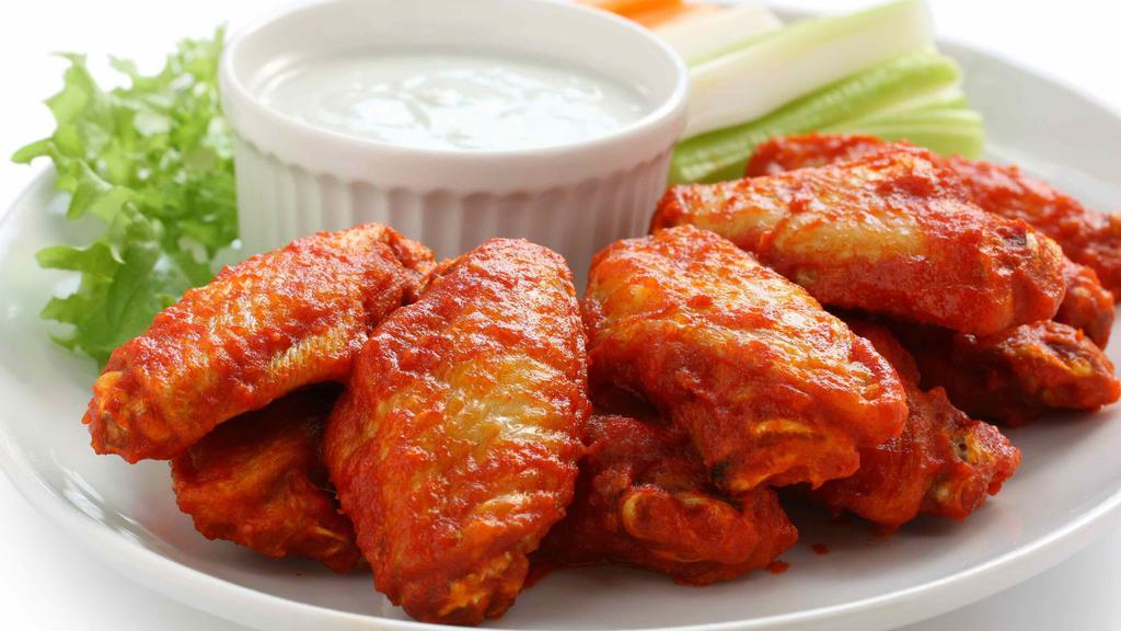 Homemade Chicken Wings (6 Pc) · With choice of sauce: buffalo, honey BBQ, sweet chilli and honey mustard sauce.