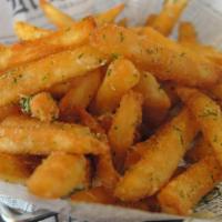 Seasoned Fries  · Our real  sliced potatoes, that are deep fried until they are golden brown and crisp texture...